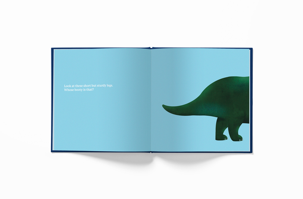 Inner page of Fifty Two World (52 World) book Whose Booty is That? Dino Version Triceratops booty in English