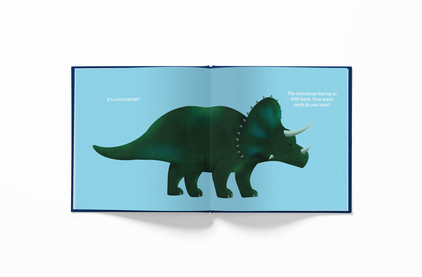 Inner page of Fifty Two World (52 World) book Whose Booty is That? Dino Version Triceratops in English